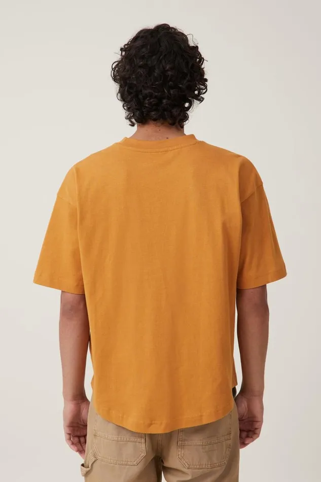 Men Tees and Tanks Cotton On Box Fit Scooped Hem TShirt Buckskin Gold